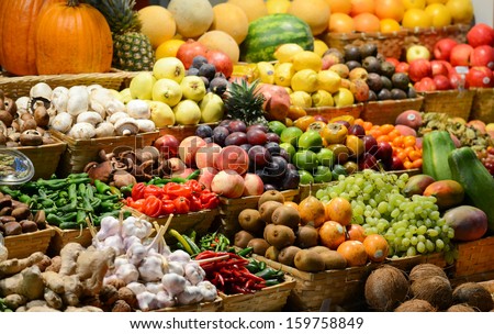 Fruit market with various colorful fresh fruits and vegetables - Market series