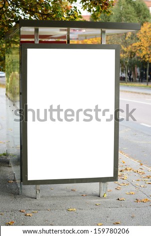 Blank billboard on city bus station