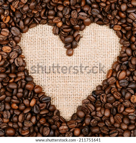 Heart coffee frame made of coffee beans on burlap background