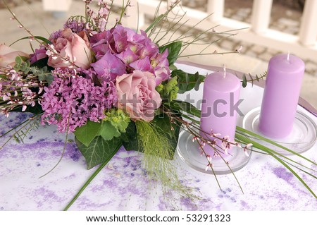 stock photo Violet wedding decoration with flowers and candles