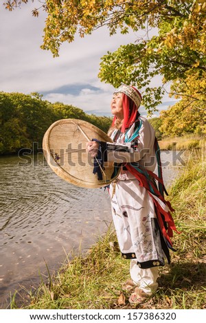 The woman the shaman will execute a ceremony - causes spirit of water...