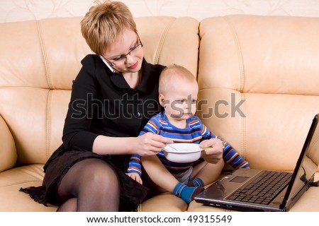 busy mom with little son