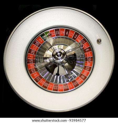 Ball is rolling on a roulette wheel