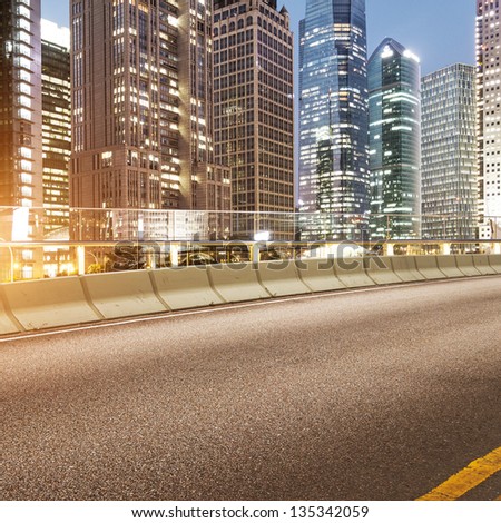 The city and the road in the modern office building background