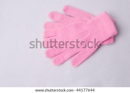 Children\'s wear - woollen gloves isolated over white background