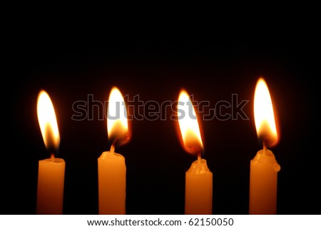 candle bright light in dark night