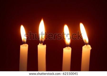 candle bright light in dark night