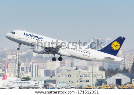 ISTANBUL , TURKEY  - JANUARY 15, 2014: Aircraft of German Lufthansa Airlines,  is taking off from Istanbul Ataturk International Airport  on June  15, 2014. The aircraft is an Airbus A320-214