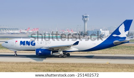 ISTANBUL , TURKEY - FEBRUARY 9, 2015: Aircraft of MNG Cargo Airlines, is making taxi at Istanbul Ataturk International Airport on February 9, 2015 . Aircraft is an Airbus A330-200
