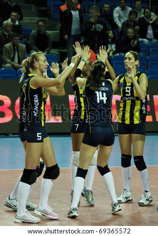 ISTANBUL, TURKEY - NOVEMBER 21 : World champion Fenerbahce women\'s volleyball team players cheers a point  on November  21, 2010 in Istanbul, Turkey.