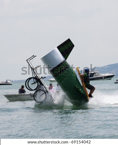 ISTANBUL, TURKEY - MAY 23 : Model airplane in flying festival crashes to sea  at Caddebostan coast on May 23, 2010 in Istanbul, Turkey. Red Bull Flugtag is organized as an aviation fiesta every year