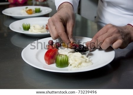 Chef is working on an appetizer