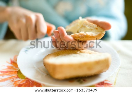 Simple breakfast with bread and butter in the morning