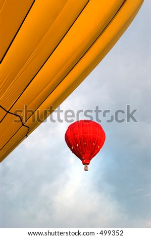 Hot air ballooning on a calm morning.