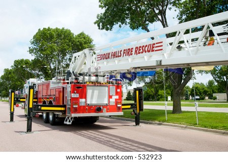 Fire truck with extension ladder.