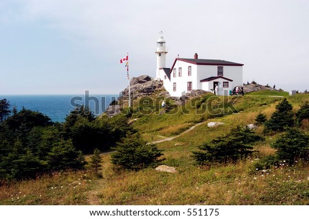 Lobster Cove Head  Lighthouse on the shore of the Gulf of St. Lawrence in Newfoundland, Canada.