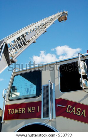 Ladder extended on a fire truck.