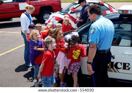 Police department educational outreach during Flag Day.
