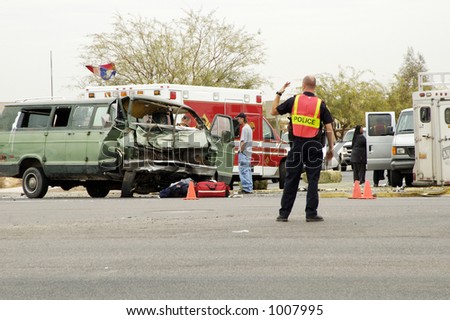 stock-photo-major-damage-caused-by-a-collision-at-an-intersection-in-a-suburban-area-1007995.jpg
