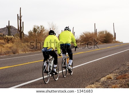 Riders in a bike race through the Arizona desert.
