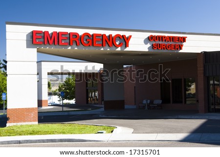 an sign above the emergency entrance to a hospital