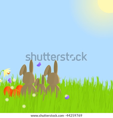 Three brown rabbits watching butterflies in a flowery meadow on a sunny Spring day, with three Easter eggs sitting to their left side.  Copy space provided.