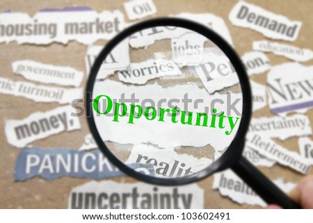 News headlines and magnifying glass with Opportunity text