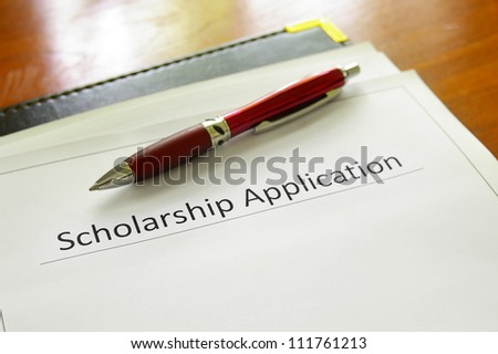 student scholarship application form on a desk
