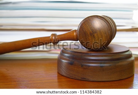 judges gavel and court papers on a desk