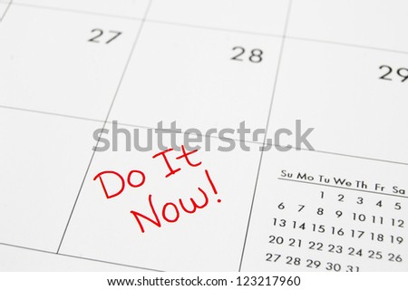 closeup of a calendar with Do It Now text