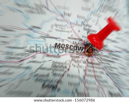 Closeup of a red push pin in map of Moscow, Russia
