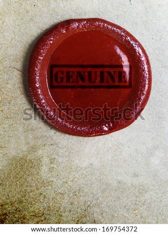 real wax stamp with Genuine text, on old paper