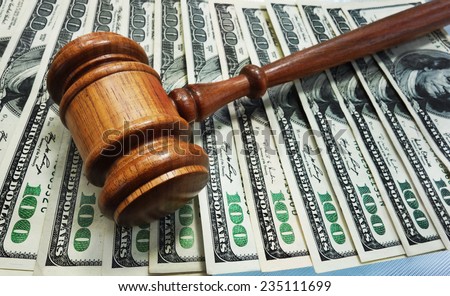 Law gavel on money