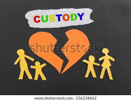 Paper family with broken heart and Custody text