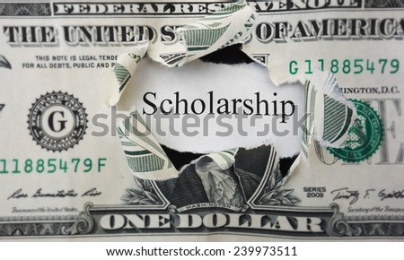 Torn dollar hole with Scholarship paper note