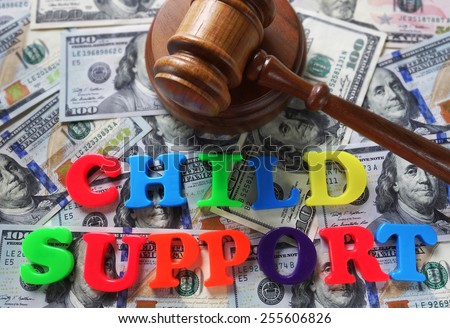 Child Support letters with gavel and cash
