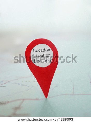 Red locator symbol on a map with Location Location Location label