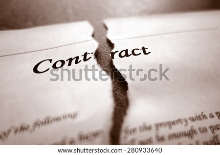 Closeup of torn legal contract