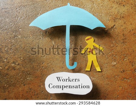 bandaged paper man under umbrella with Workers Compensation note below
