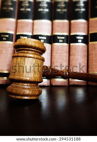 court legal gavel with law books