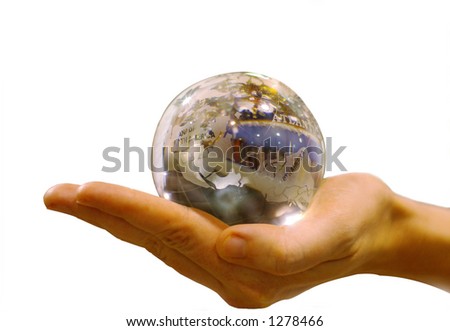 woman\'s hand holding glass globe, isolated with clipping path