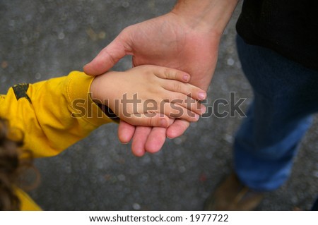 father and son holding hands. stock photo : Father and son