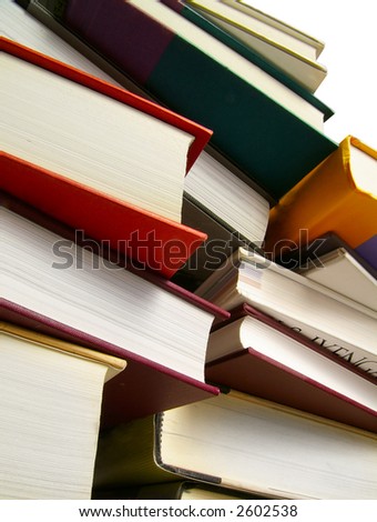 Various hardcover books stacked, isolated on white with clipping path