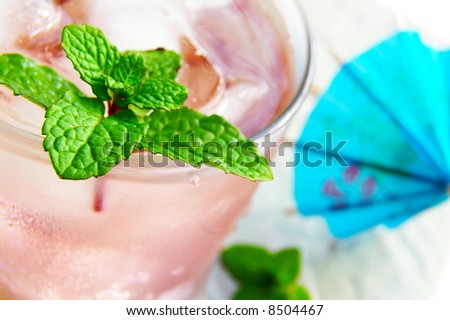 Closeup of a cool tropical drink with fresh mint