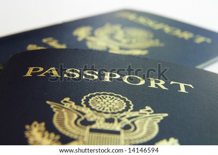 Closeup of two American passports, front view