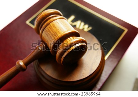 court gavel on top of a law book