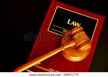 judges court gavel on a law book, from above