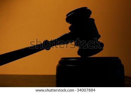 judges court gavel silhouette on blue background