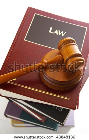 Judges legal gavel on a pile of law books