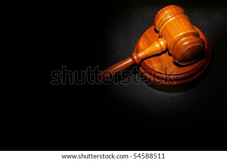 judge\'s legal gavel on a law book